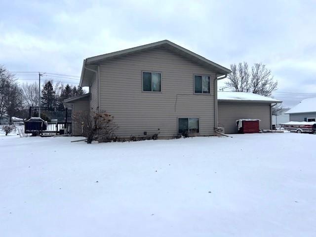 view of snow covered property