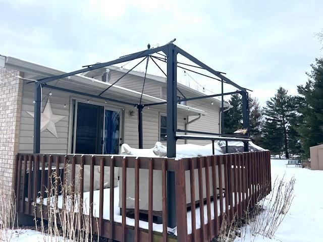 view of snow covered house