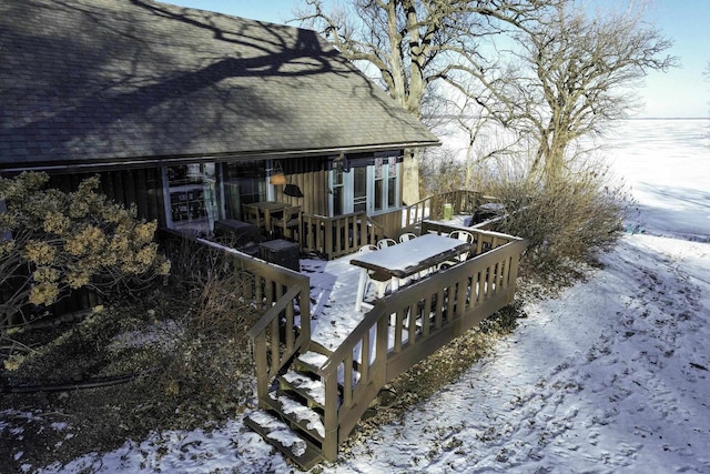 view of snow covered deck