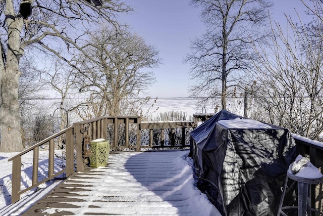 view of snow covered deck