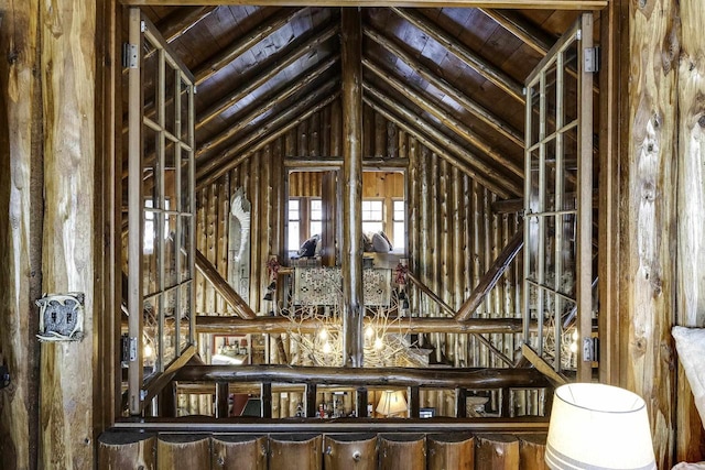 misc room featuring wooden ceiling and vaulted ceiling with beams