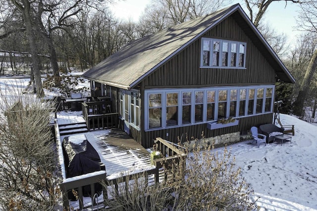 view of snow covered house