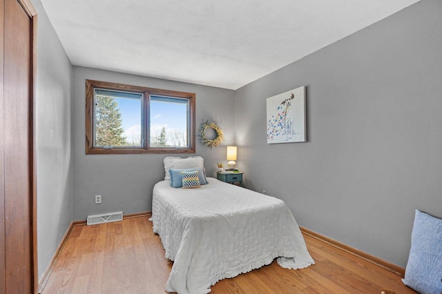 bedroom featuring light hardwood / wood-style floors