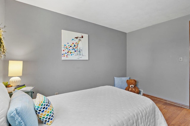 bedroom featuring light wood-type flooring