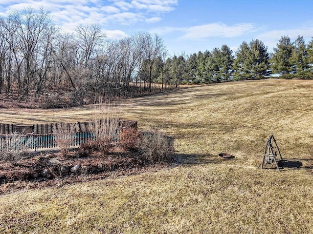 view of yard featuring a swimming pool