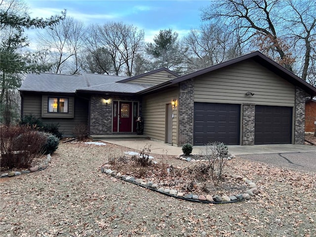 ranch-style home with a garage