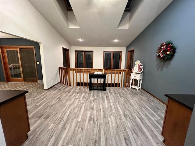 wooden terrace featuring a baseboard heating unit