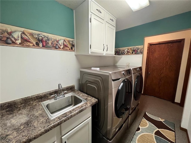 laundry room featuring cabinets, sink, washing machine and dryer, and dark colored carpet