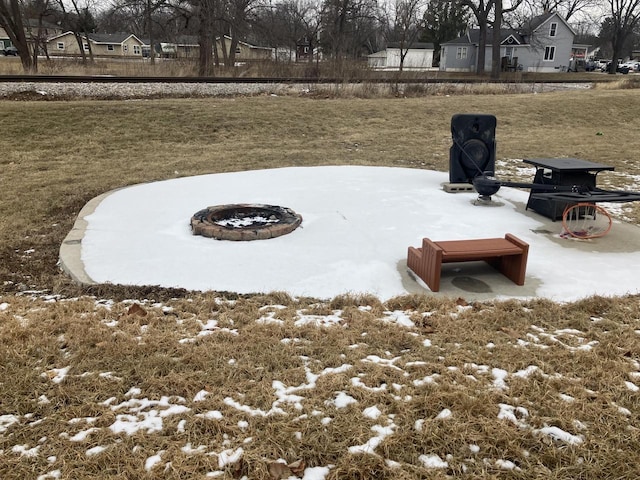 entry to storm shelter with a yard and a patio