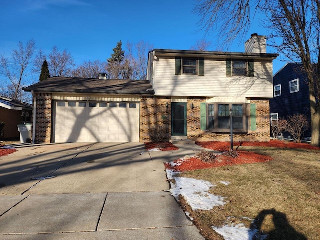 view of front facade featuring a garage and a front lawn