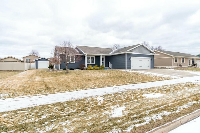 ranch-style house featuring a garage