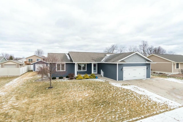 single story home with a garage and a front yard