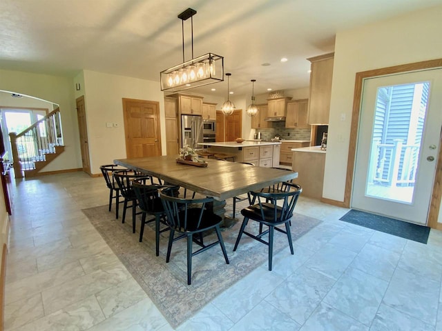 dining room featuring plenty of natural light