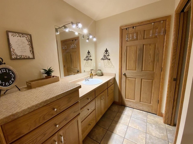 bathroom featuring vanity and tile patterned flooring