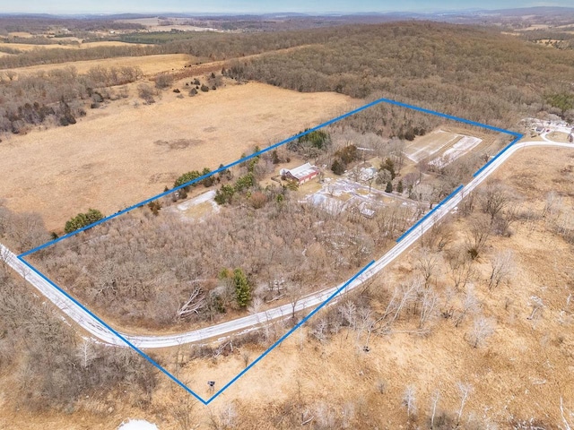 birds eye view of property featuring a rural view