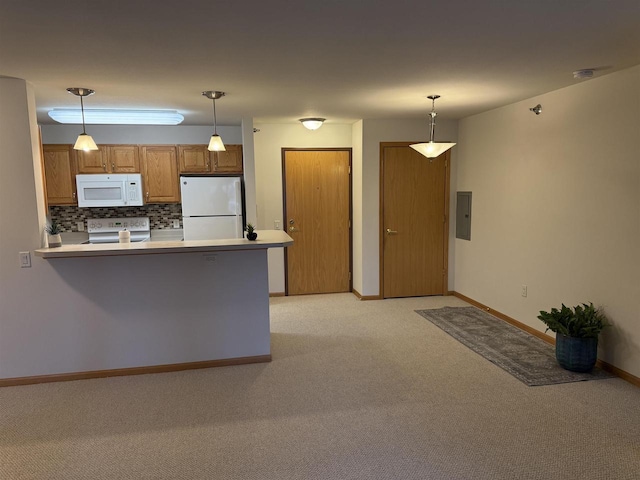 kitchen featuring kitchen peninsula, decorative backsplash, white appliances, light colored carpet, and hanging light fixtures