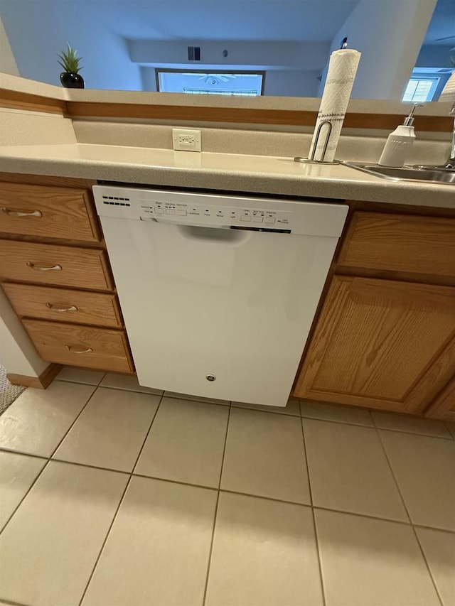 kitchen with dishwasher and tile patterned floors