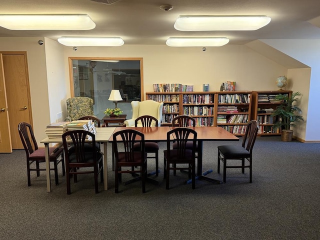 dining area featuring carpet