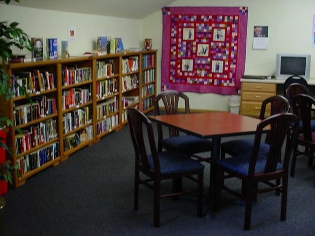 view of carpeted dining area