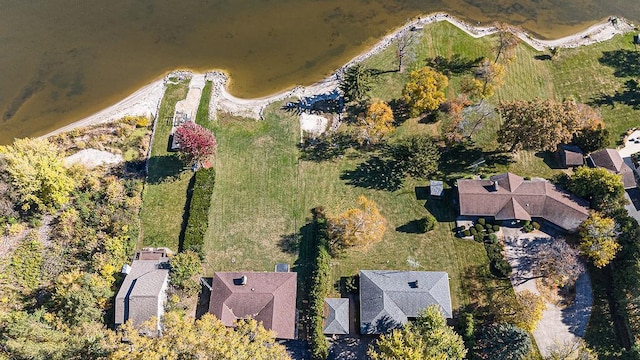 drone / aerial view with a water view