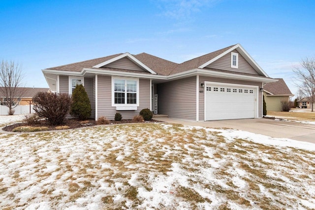 single story home with a garage