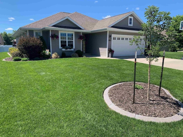 ranch-style home with a garage and a front yard