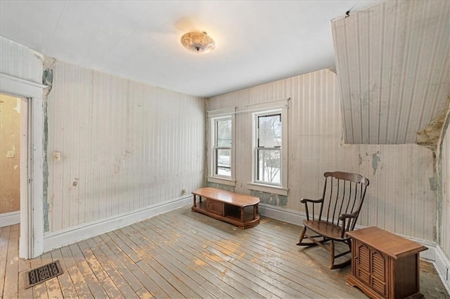 living area with wood-type flooring