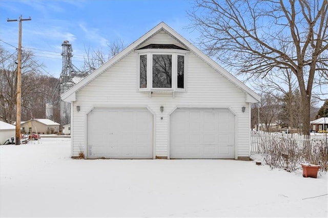 view of snow covered garage