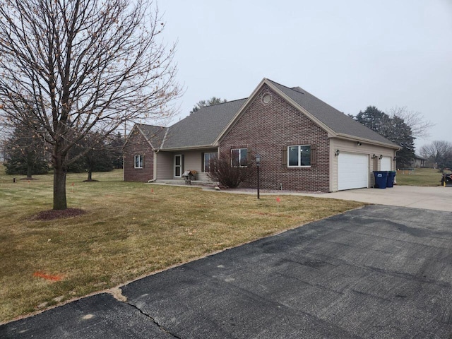 single story home with a garage and a front yard