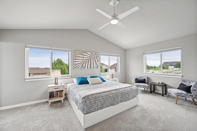 bedroom featuring ceiling fan, carpet floors, and lofted ceiling