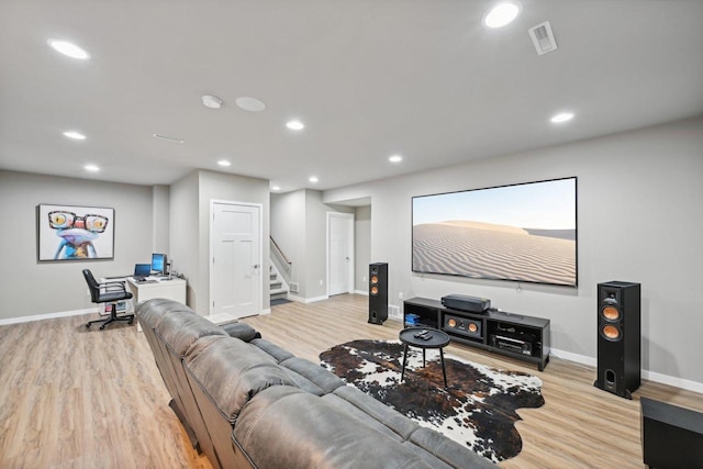 living room with light hardwood / wood-style flooring