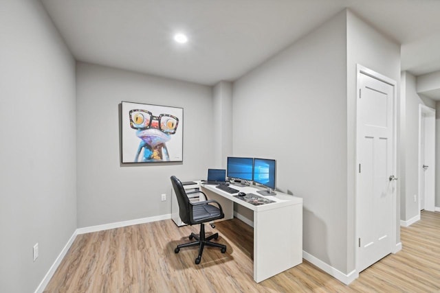 office space featuring light wood-type flooring