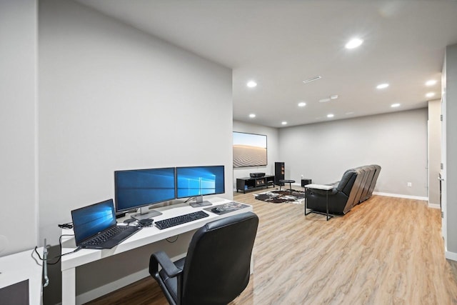 office space featuring light wood-type flooring