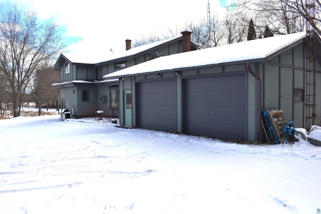 exterior space with a garage