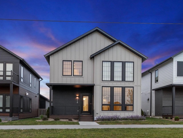 view of front of property with a lawn