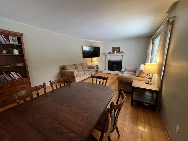 dining room with light hardwood / wood-style flooring