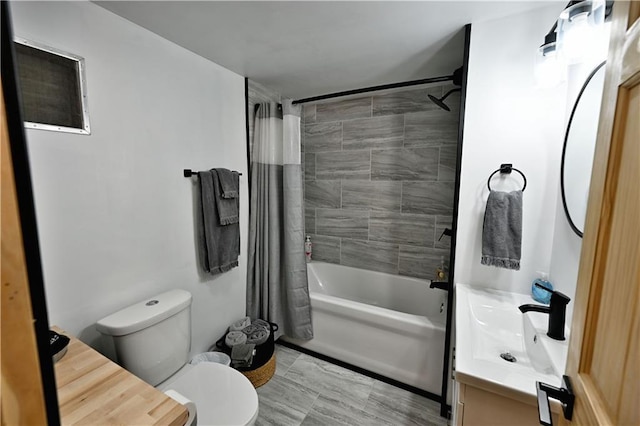 full bathroom with toilet, vanity, and shower / tub combo with curtain