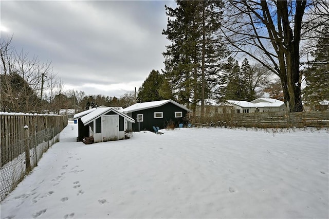 view of snow covered property