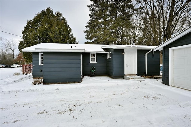 view of snow covered property