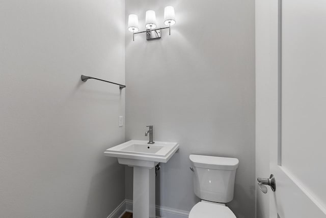 bathroom featuring toilet