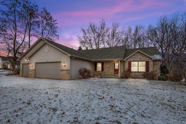 single story home featuring a garage