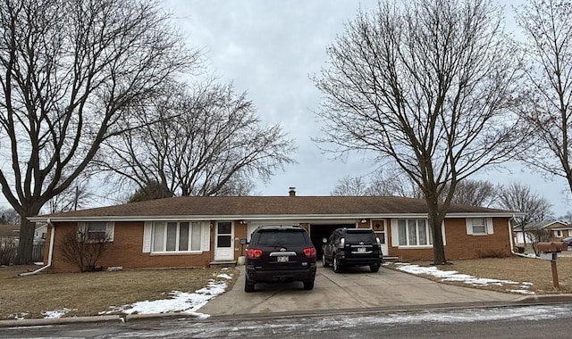 single story home featuring a garage