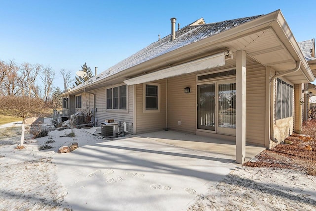 back of house with cooling unit