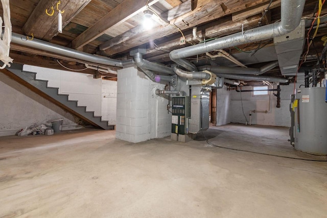 basement with heating unit and water heater