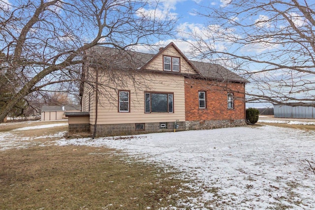 view of snow covered property