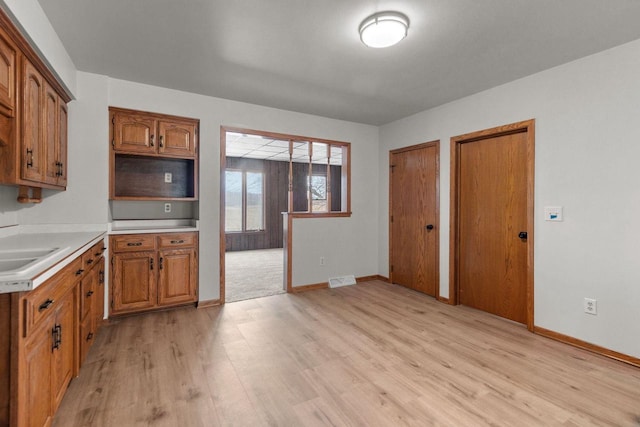 kitchen featuring sink and light hardwood / wood-style flooring