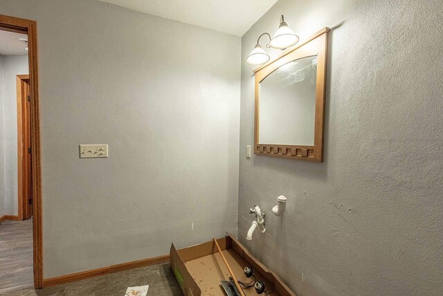 8325 S Avon Store Rd, Brodhead, WI 53520 - bathroom featuring baseboards