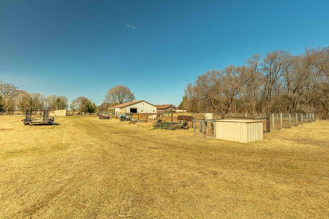 8325 S Avon Store Rd, Brodhead, WI 53520 - view of yard with an outbuilding and fence