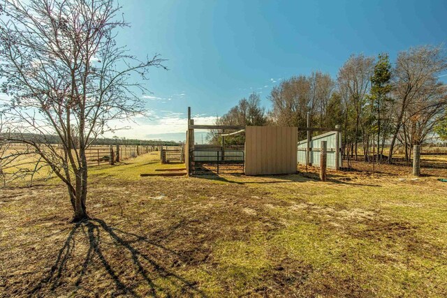 8325 S Avon Store Rd, Brodhead, WI 53520 - view of yard with a rural view, an outdoor structure, and fence