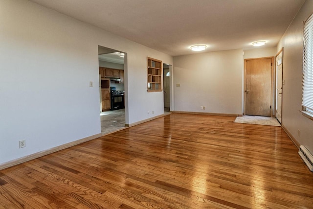 empty room with wood-type flooring